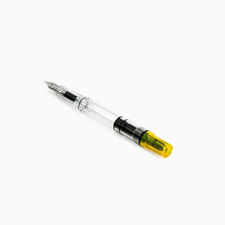 TWSBI ECO Transparent Yellow Fountain Pen Uncapped on table
