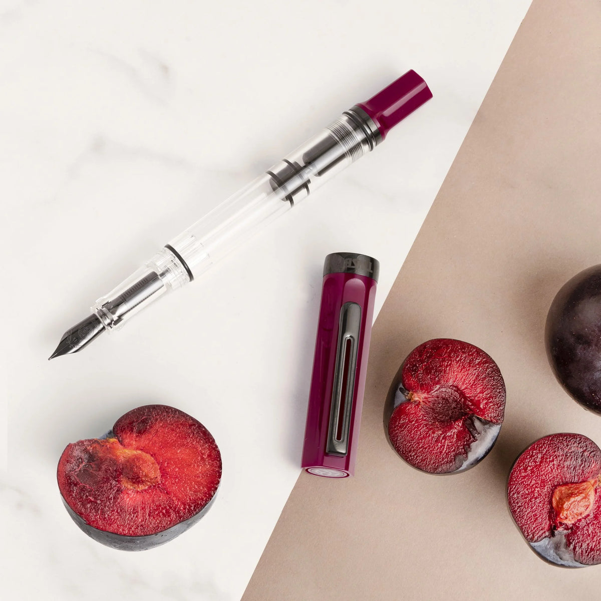 TWSBI ECO Plum + Onyx Fountain Pen Uncapped on Table