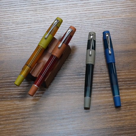 Opus 88 Koloro Ebonite Fountain Pens on Table Full Length