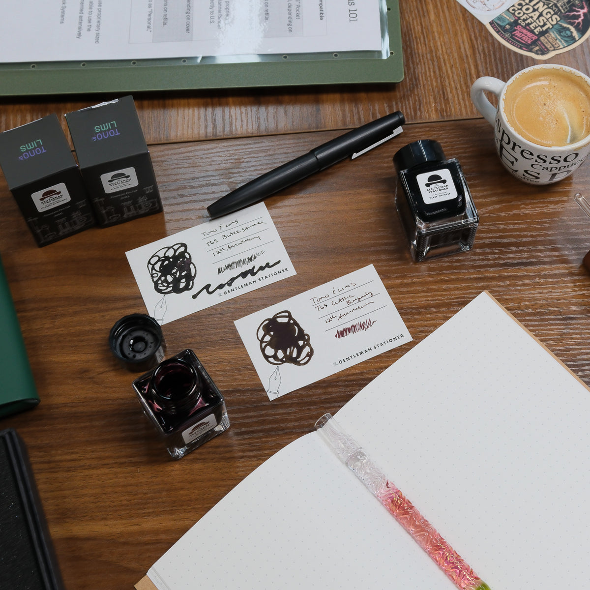 TGS x Tono & Lims 12th Anniversary Inks on Desk with Pens and Coffee