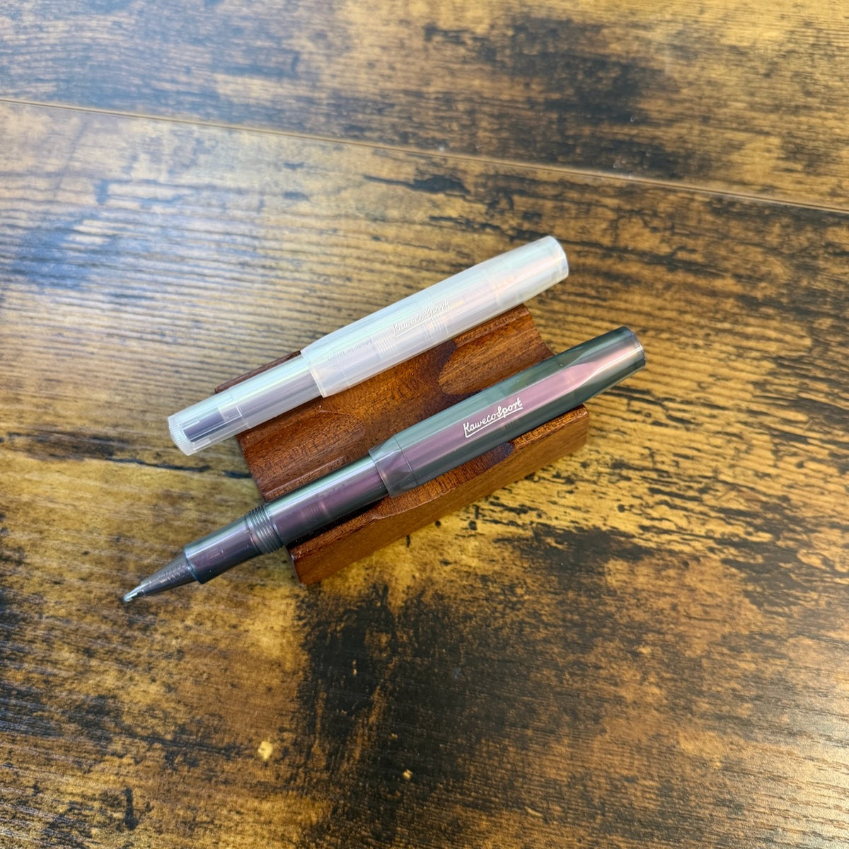 Kaweco Lunar Sport Rollerballs in Lunar Shadow Purple and Lunar Light Purple One Uncapped One Capped