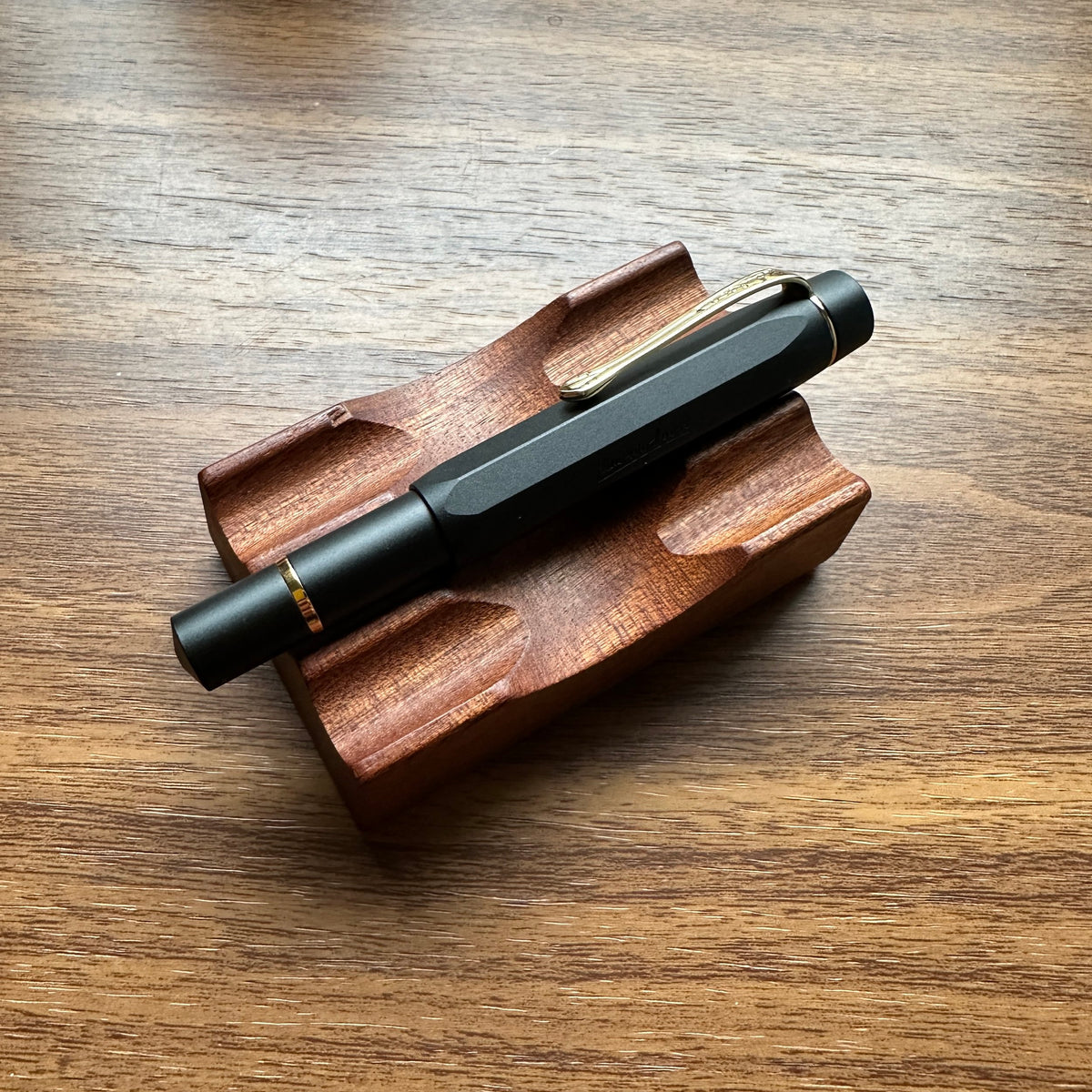 Kaweco AL-Sport Piston Filler (Black) on Pen Stand