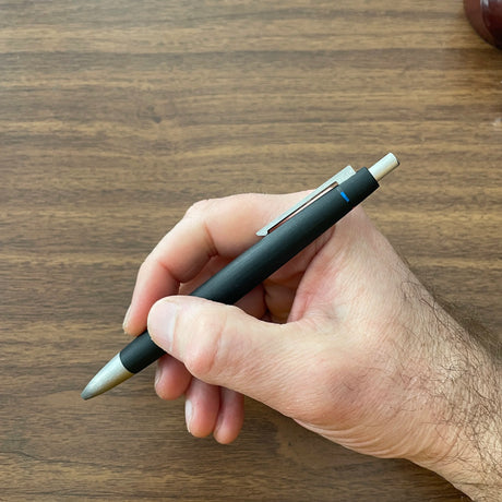 Lamy 2000 4-Color Ballpoint In Hand with Knock Extended