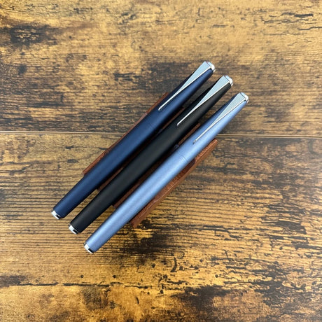 Lamy Studio Rollerball Pens Sitting on Pen Stand
