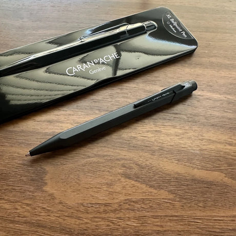 Caran d'Ache 849 Ballpoint XL Black Code on Table