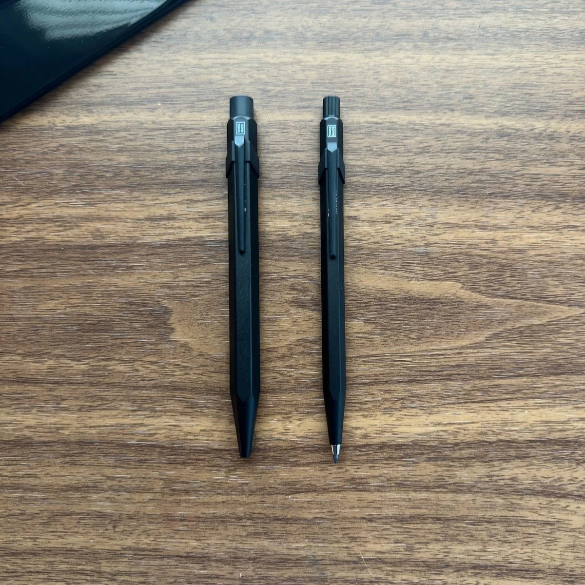 Caran d'Ache Fixpencil Black Code shown with Jumbo 849 Pen