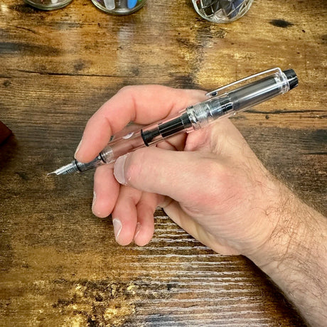 Pilot Custom Heritage 92 Demonstrator Fountain Pen with cap posted on back in-hand