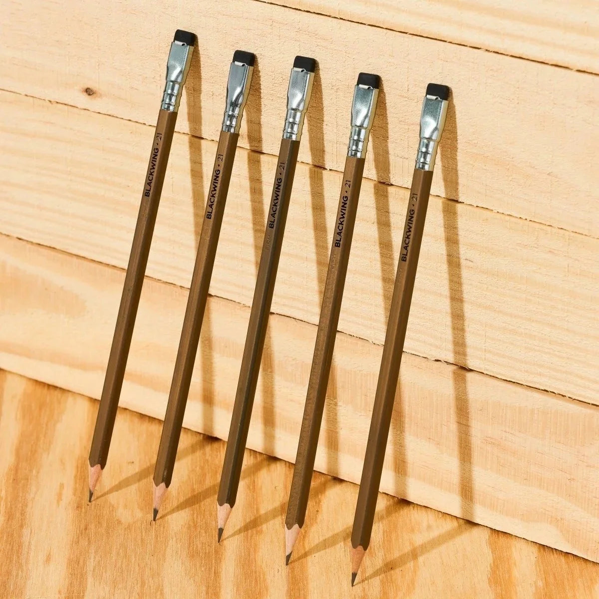 Blackwing Volume 21 Woodworking Pencil Leaning against Wood