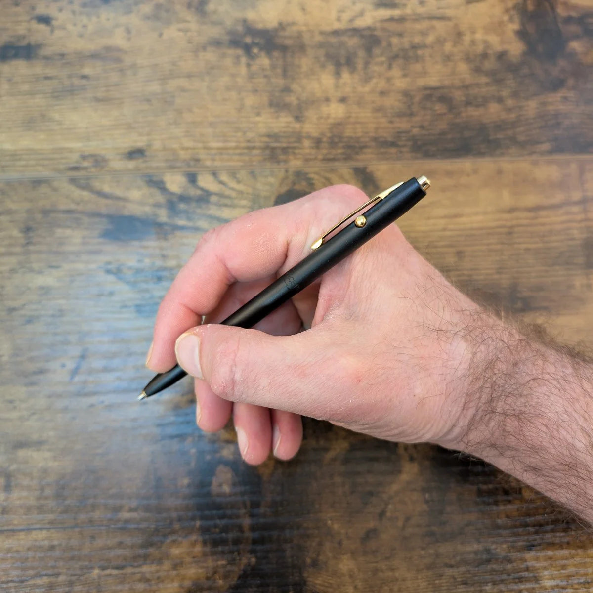 Fisher Space Pen Shuttle Pen in hand
