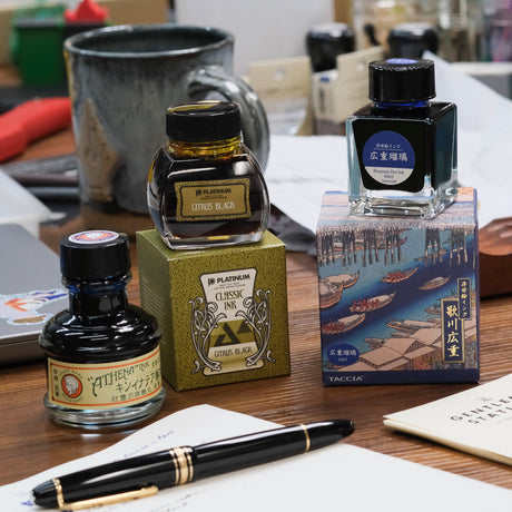 Bottled Ink On Table