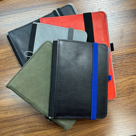 Notebook Systems Stacked on a Table