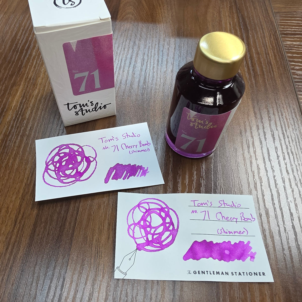Tom's Studio Shimmer Ink No. 71 Cherry Bomb Swatch and Bottle