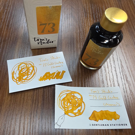 Tom's Studio Bottled Shimmer Ink No. 73 Gold Lustre Swatch and Bottle