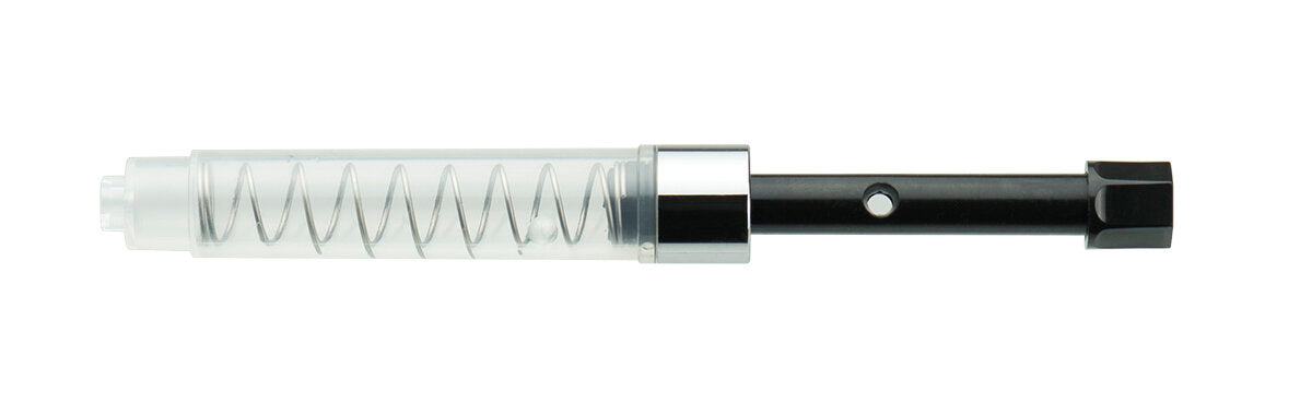 A black and silver TWSBI pump fountain pen converter