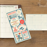 2027 TRAVELER'S Notebook Pencil Board Showing front and back on desk