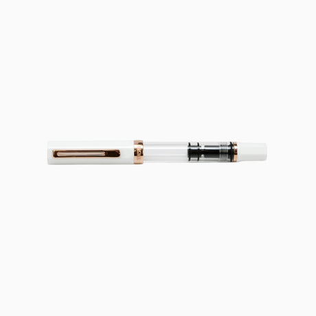TWSBI White and Rose Gold Fountain pen capped on a white background