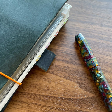 Midori Notebook Tabs Shown in Notebook in Traveler's Cover