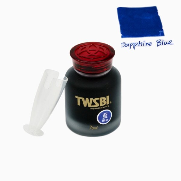 TWSBI Sapphire Blue ink bottle with red cap and sapphire blue ink swatch on a white background
