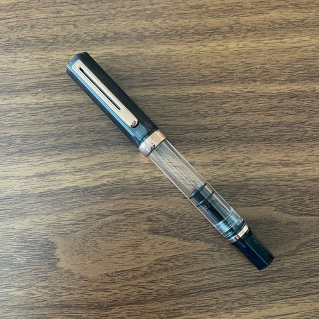 TWSBI ECO Smoke Rose Gold Fountain Pen Capped on Desk