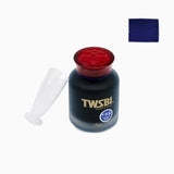 TWSBI Midnight Blue ink bottle with red cap and white cap on a white background