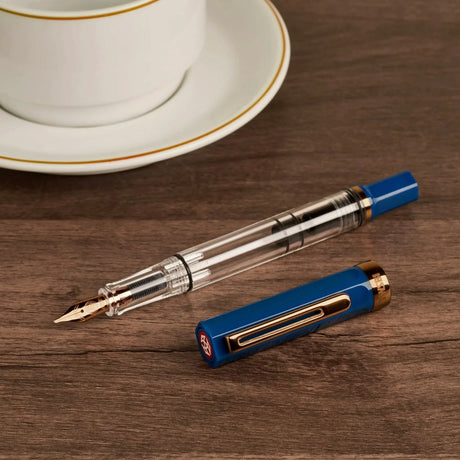 TWSBI ECO Indigo + Bronze Fountain Pen Uncapped on Table
