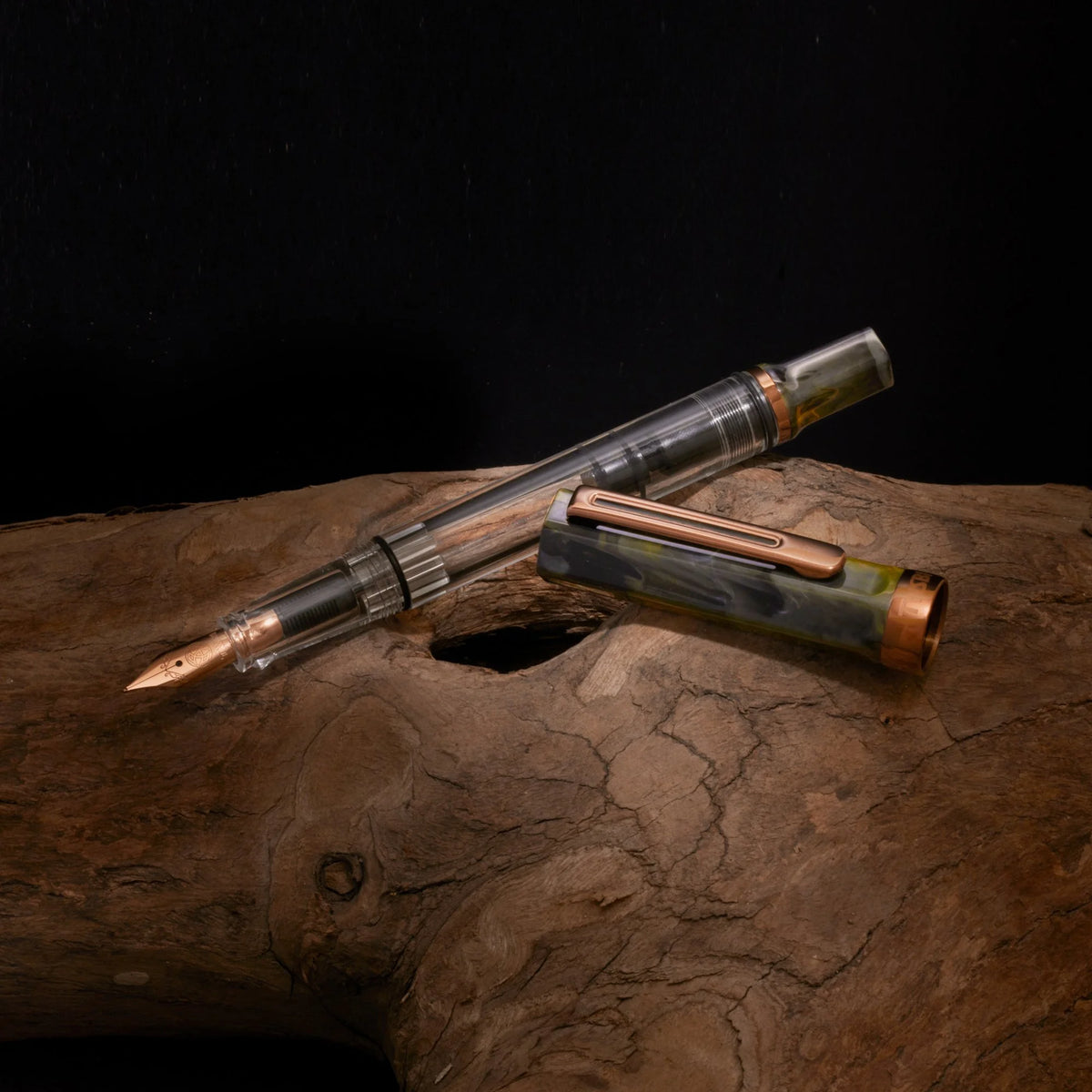 TWSBI ECO Serpentine Bronze Fountain Pen Uncapped on Wood