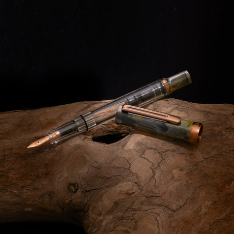 TWSBI ECO Serpentine Bronze Fountain Pen Uncapped on Wood