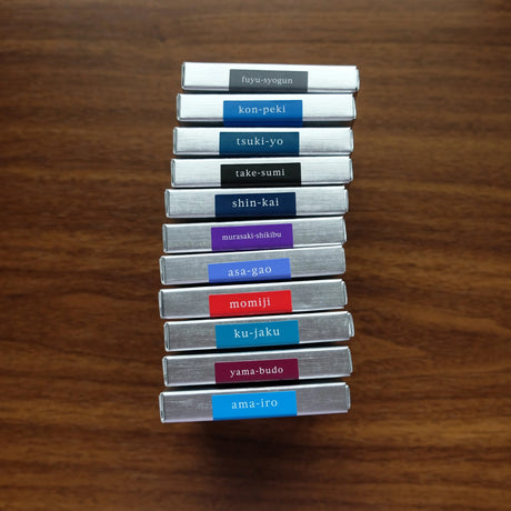 Pilot Iroshizuku Fountain Pen Ink Cartridges Stacked on Table in Boxes