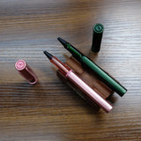 Lamy AL-Star Pine and Flamingo Rollerball Pens Uncapped