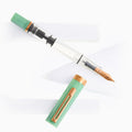TWSBI ECO Jade Jelly Plus Bronze Fountain Pen Uncapped on White Background