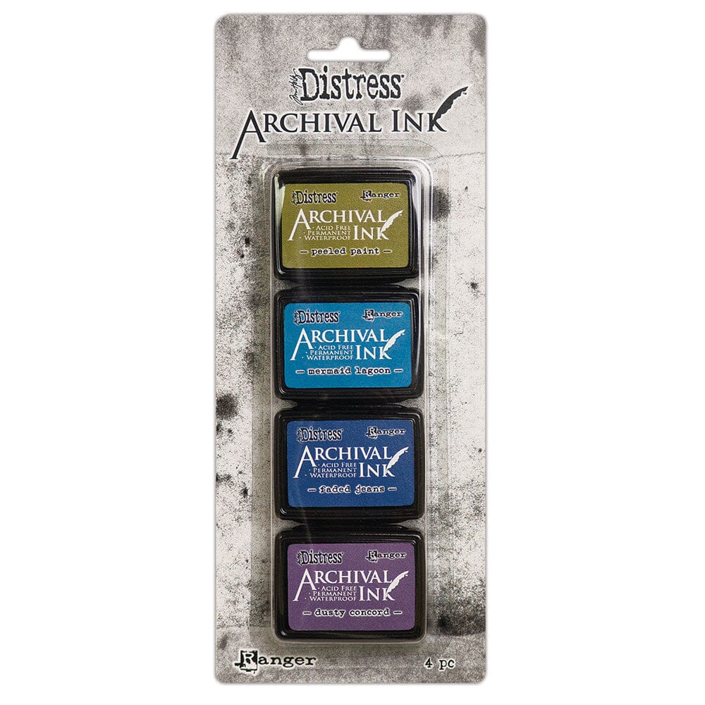 Ranger Ink Mini Stamp Pad 4-pack featuring Tim Holz Distress Inks Peeled Paint, Faded jeans, Mermaid Lagoon, and Dusty Concord Colors shown in packaging