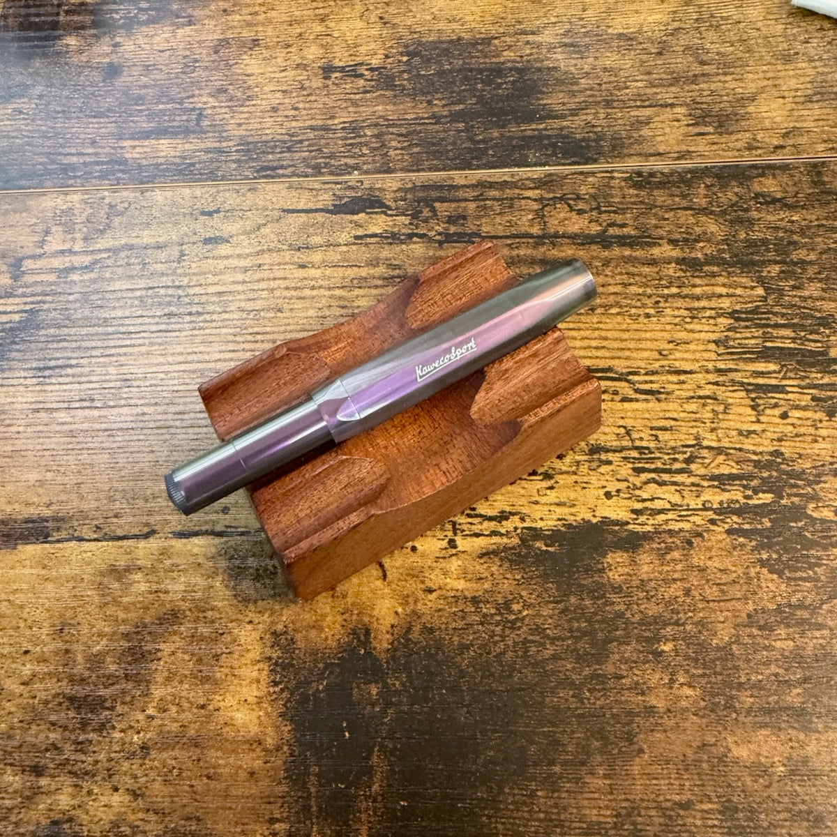 Kaweco Lunar Purple Sport Fountain Pen in Shadow Purple on pen stand