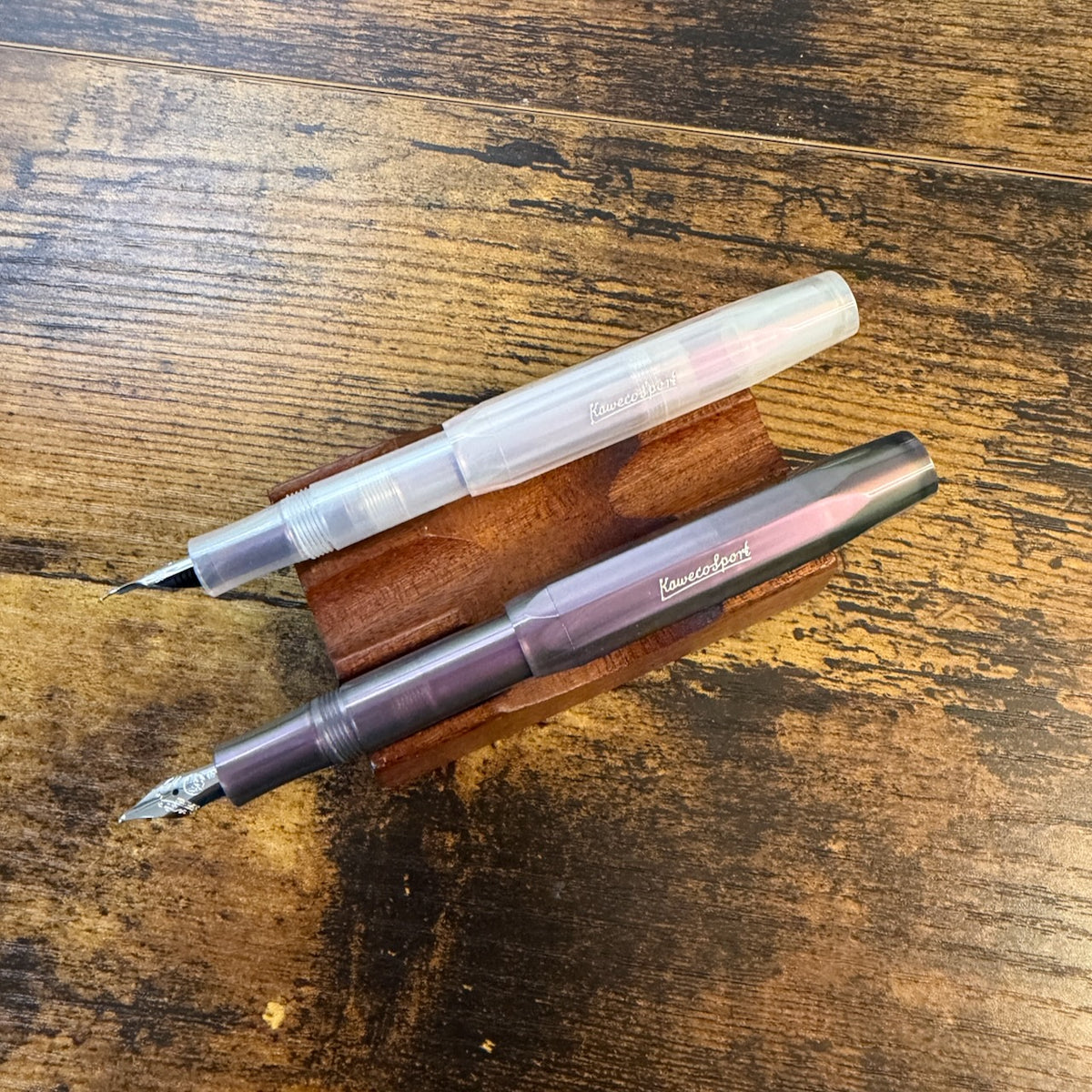 Kaweco Lunar Purple Sport Fountain Pens Posted Showing Nibs on Pen Stand