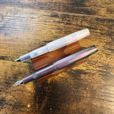Kaweco Lunar Purple Sport Fountain Pens Posted Showing Nibs on Pen Stand