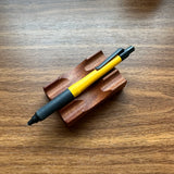 Uni Kuru Toga Alpha Gel Switch Mechanical Pencil in yellow with black trim and gel grip.