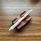 Uni Kuru Toga Alpha Gel Switch Mechanical Pencil in pale pink with clear gel grip.