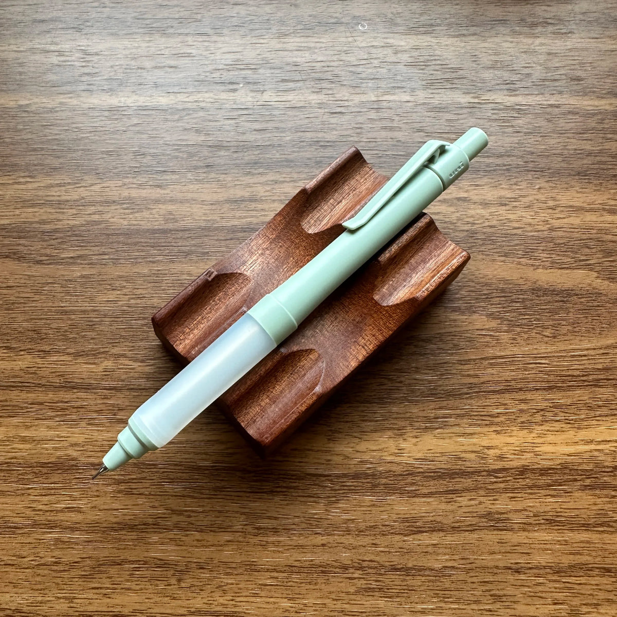 Uni Kuru Toga Alpha Gel Switch Mechanical Pencil in pale green with clear gel grip.