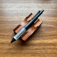 Uni Kuru Toga Alpha Gel Switch Mechanical Pencil in all black with clear gel grip.