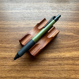 Uni Kuru Toga Alpha Gel Switch Mechanical Pencil in olive green with black trim and black gel grip.
