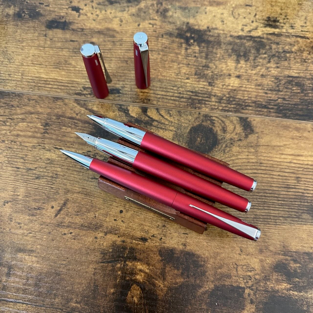 Lamy Studio Royal Red Special Edition Ballpoint Shown with Rollerball and Fountain Pen