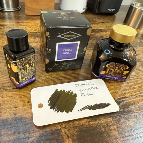Diamine Scribble Purple Swatch with Bottles