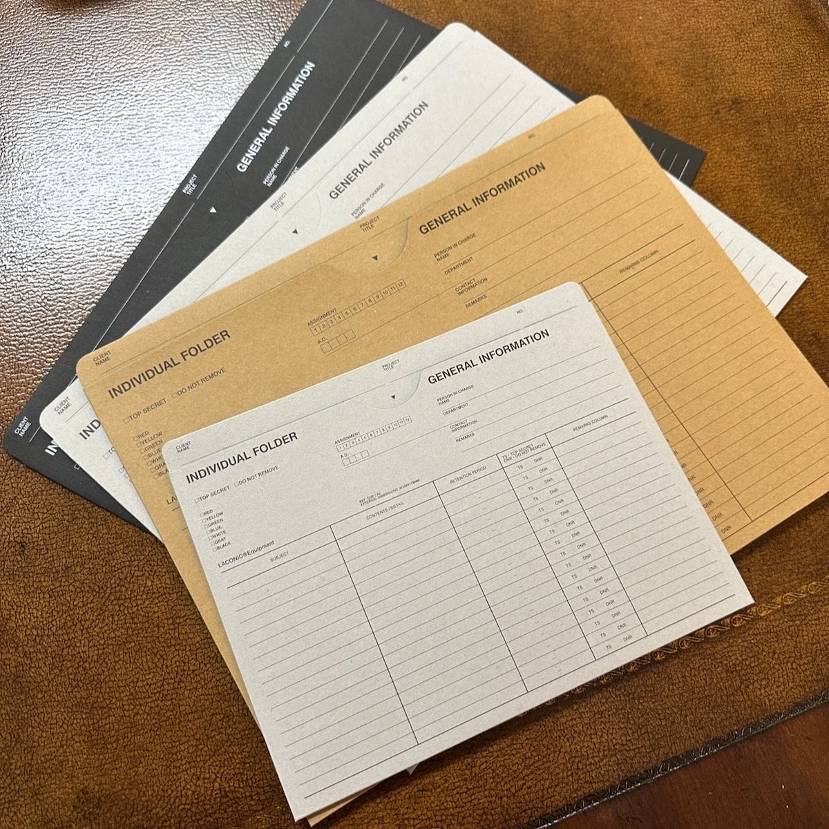 Laconic Folders A5 vs A4 compared on Table