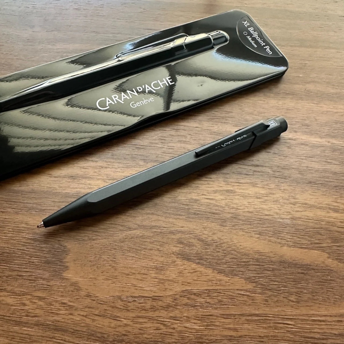Caran d'Ache 849 Ballpoint XL Black Code  on Table