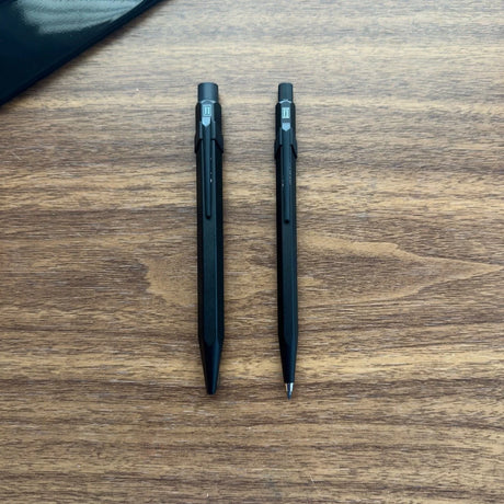 Caran d'Ache Fixpencil Black Code shown with Jumbo 849 Pen