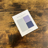 Cloth & Paper Mosaic sticky notes packaging on a wooden surface