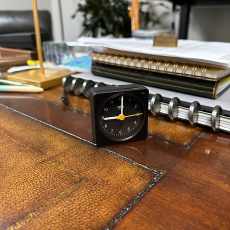 Braun Small Travel Alarm Clock Black on Desk