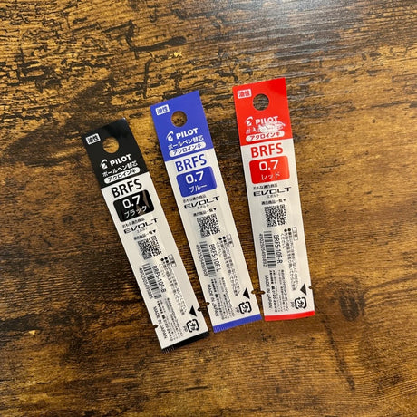 Pilot Acroball BRFS D1 Ballpoint Refill in .7mm showing three colors black blue and red