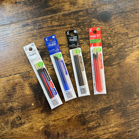 Pilot Frixion multi-pen Refills Displayed on Wood Table