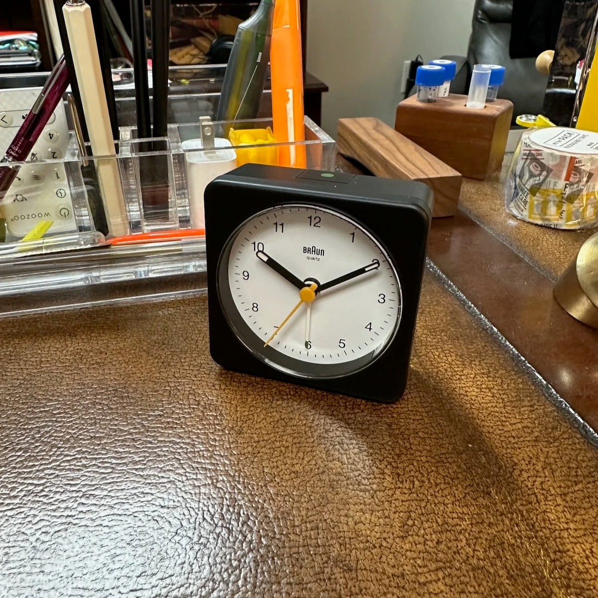 Braun Large Travel Alarm Clock on Desk for Scale