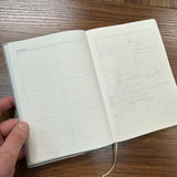 Interior spread of the NOLTY PageM Free log B6 notebook with a checklist layout labeled My 100 list.